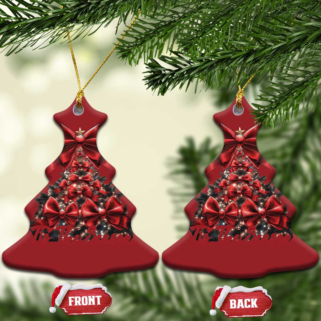 Two red Christmas tree-shaped ornaments with bow topper, gold strings attached