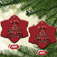 Two red star-shaped Christmas tree ornaments hanging on gold strings, front and back shown