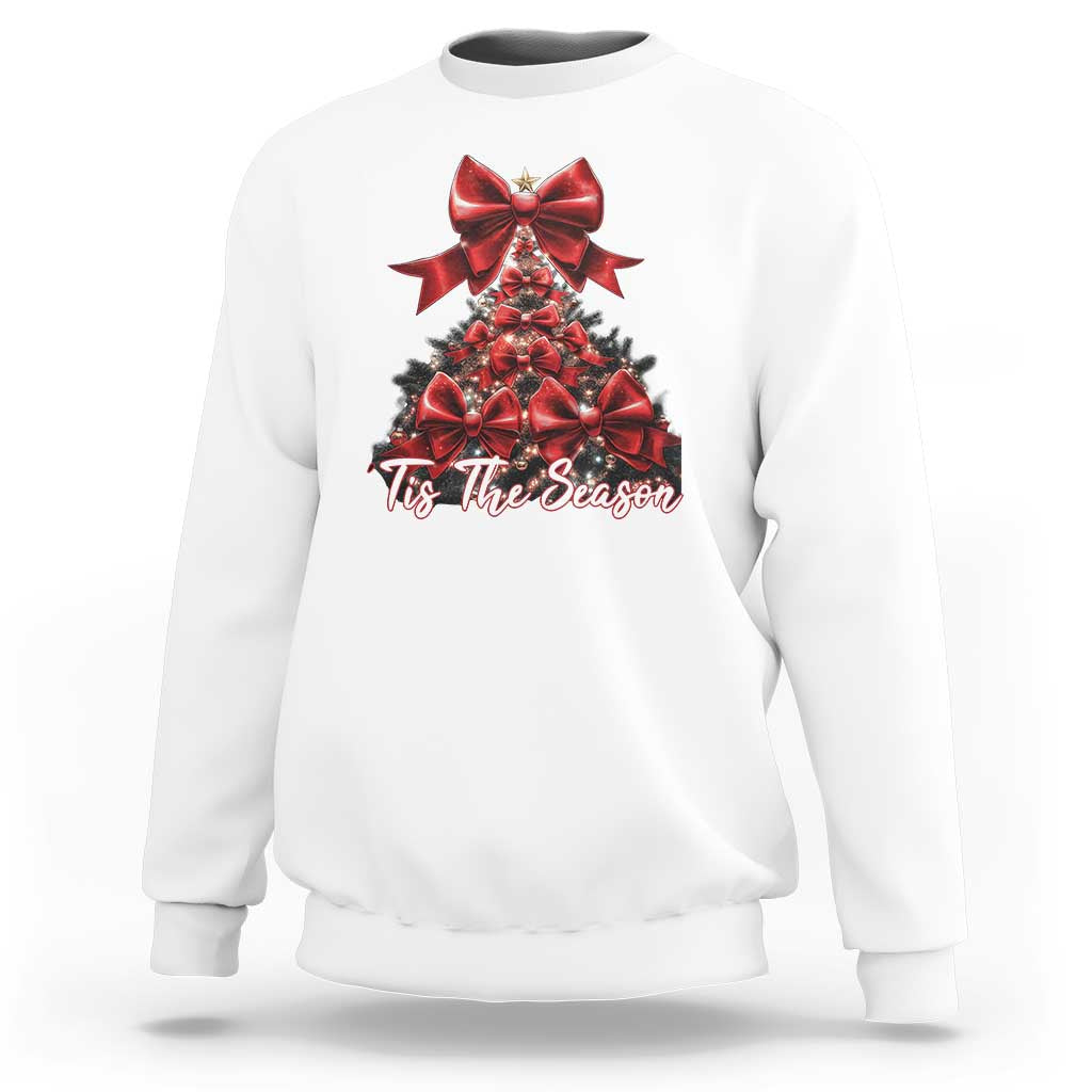White crewneck sweatshirt with red bow Christmas tree graphic and 'Tis The Season'