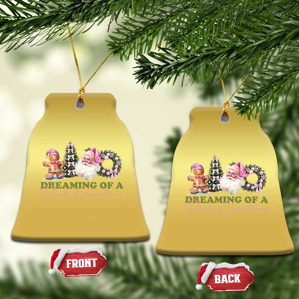 Pair of gold Christmas bell-shaped ornaments with pink holiday character graphic and cord