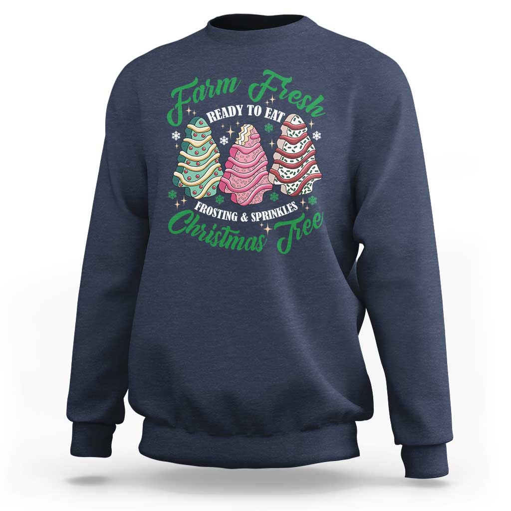 Navy sweatshirt with colorful Christmas tree cake graphic and green lettering on back
