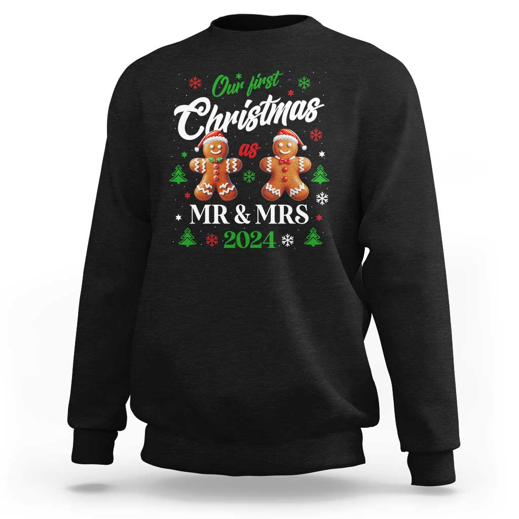 Black unisex Christmas sweatshirt with gingerbread couple 'MR & MRS 2024' graphic
