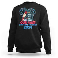 Black crewneck sweatshirt with colorful winter couple graphic and 2024 text
