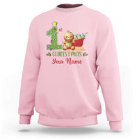 Light pink baby Christmas sweatshirt with gingerbread teddy, tree graphic, and "Your Name" text