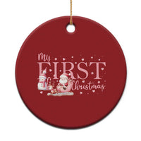 Red circular Christmas ornament with “My FIRST Christmas” text and Santa snowman graphic