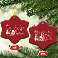 Two red snowflake-shaped “My FIRST Christmas” ornaments with Santa snowman graphic