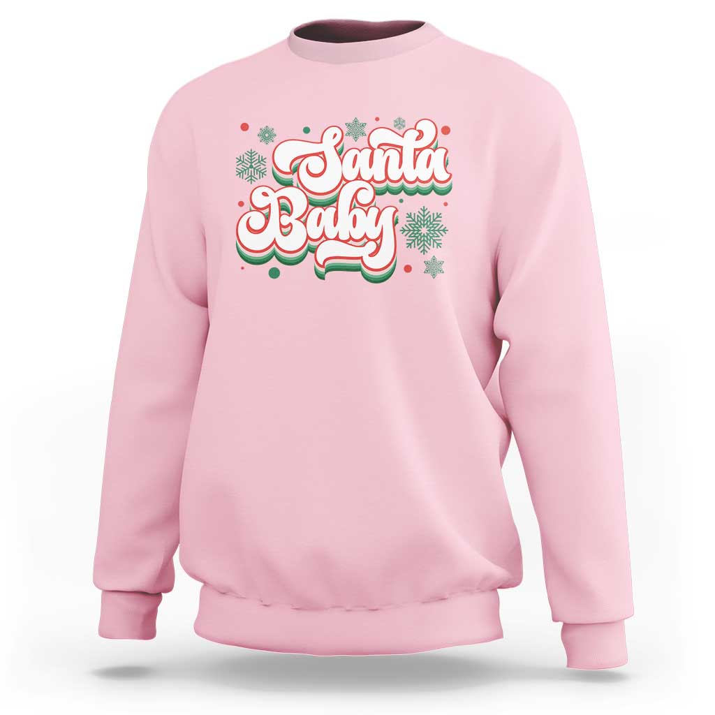 Light pink sweatshirt with 'Santa Baby' holiday graphic on chest