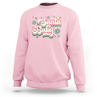 Light pink sweatshirt with 'Santa Baby' holiday graphic on chest