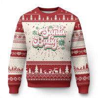 Red ugly Christmas sweater with Santa Baby graphic and festive tree pattern.