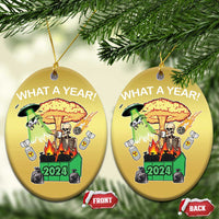Gold oval Christmas ornaments with “WHAT A YEAR!” skeleton 2024, front and back views