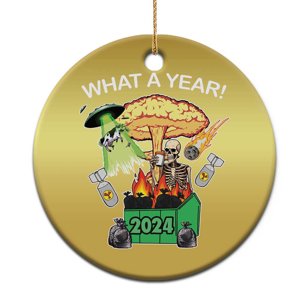 Gold circle Christmas ornament with “WHAT A YEAR!” skeleton illustration, 2024 graphic