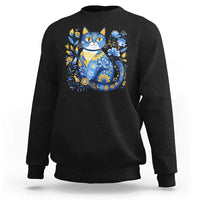 Black sweatshirt with blue floral cat graphic on the chest
