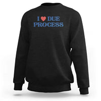 Black crewneck sweatshirt with Due Process heart logo on chest