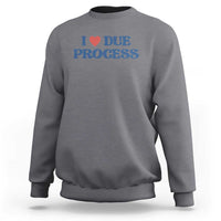 Medium gray crewneck sweatshirt with Due Process heart logo on chest