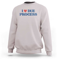 Very light gray crewneck sweatshirt with Due Process heart logo on chest