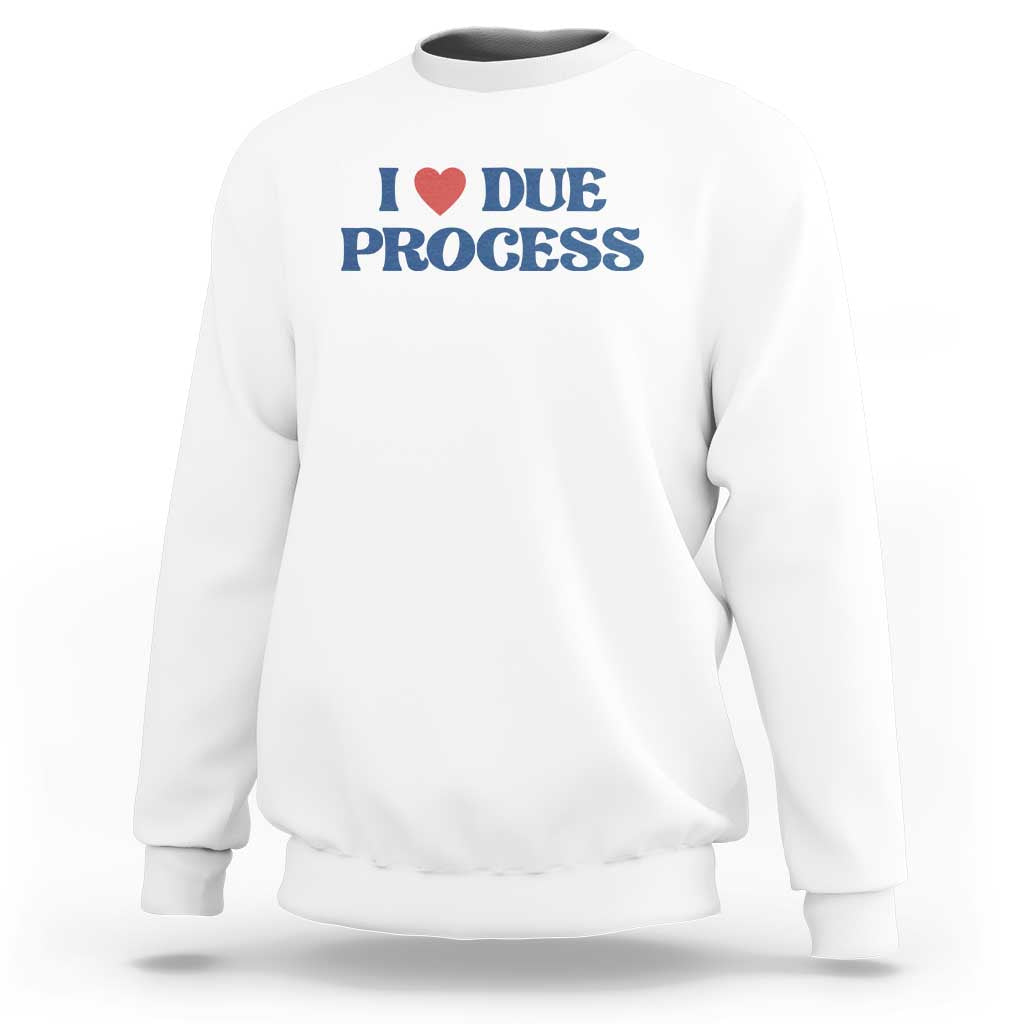White crewneck sweatshirt with Due Process heart logo on chest