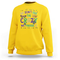 Crewneck sweatshirt in daisy yellow with glitter Mardi Gras slogan and mask graphic
