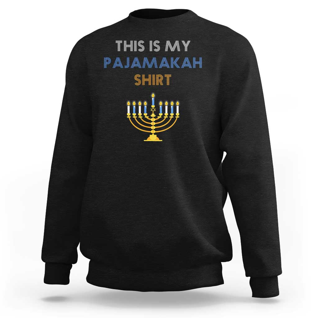 Black pajama sweatshirt with “THIS IS MY PAJAMAKAH SHIRT” text and menorah graphic