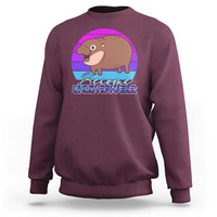 Maroon pullover sweatshirt with cute baby hippo graphic on the chest