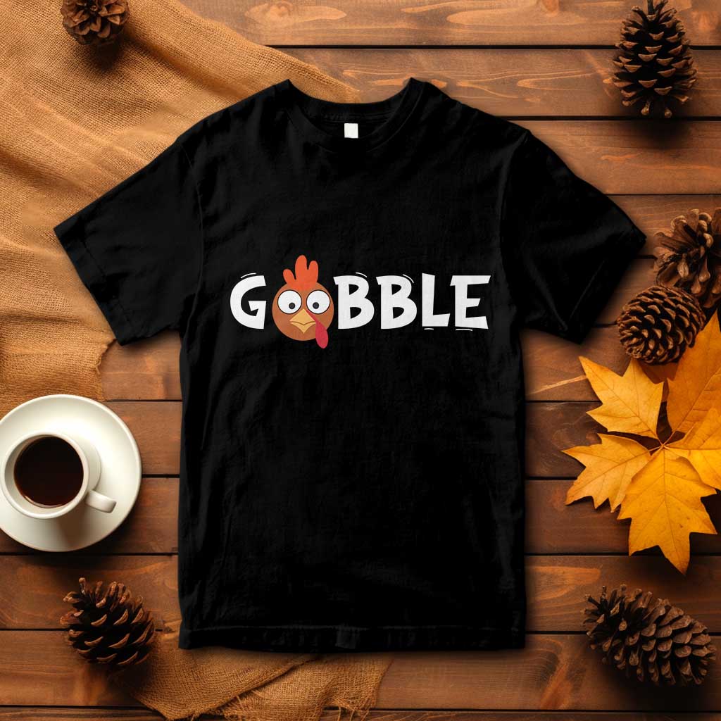 Black Thanksgiving tee with 'GOBBLE' turkey graphic on front.