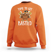 Orange turkey Thanksgiving sweatshirt with 'TIME TO GET BASTED' chest graphic