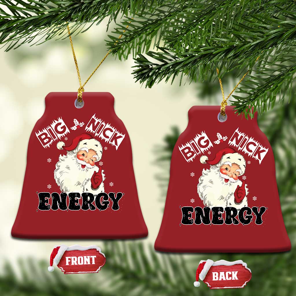 Two red bell-shaped ornaments with Santa “Big Nick Energy,” gold hanging strings