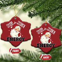 Two red oval ornaments with Santa “Big Nick Energy,” gold hanging strings