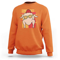 Orange turkey graphic sweatshirt with crew neck and long sleeves