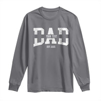 Charcoal gray long-sleeve shirt with white graphic text and "EST. 2025"