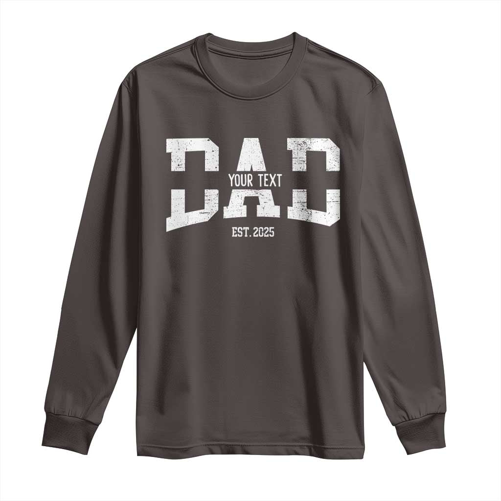 Dark gray long-sleeve shirt with white graphic text and "EST. 2025"