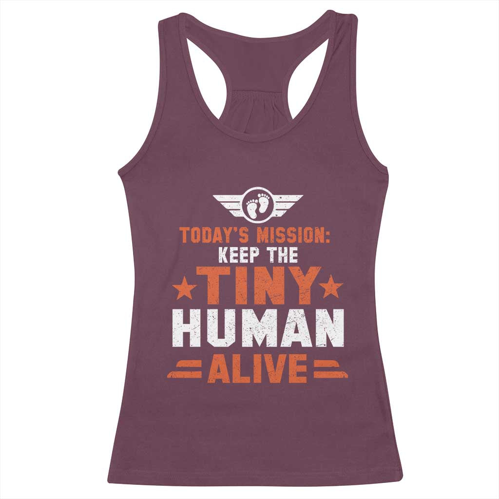 Maroon racerback tank top with “Tiny Human Alive” novelty graphic on front