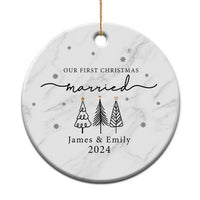 White marble round ornament, 'Our First Christmas married James & Emily 2024'.