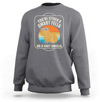 Gray heather sweatshirt with capybara graphic front, crewneck long sleeves and ribbed hem