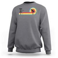 Gray disc golf retro sweatshirt with vintage frisbee player graphic on chest