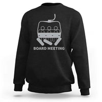 Black crewneck sweatshirt with 'Board Meeting' snowboard graphic