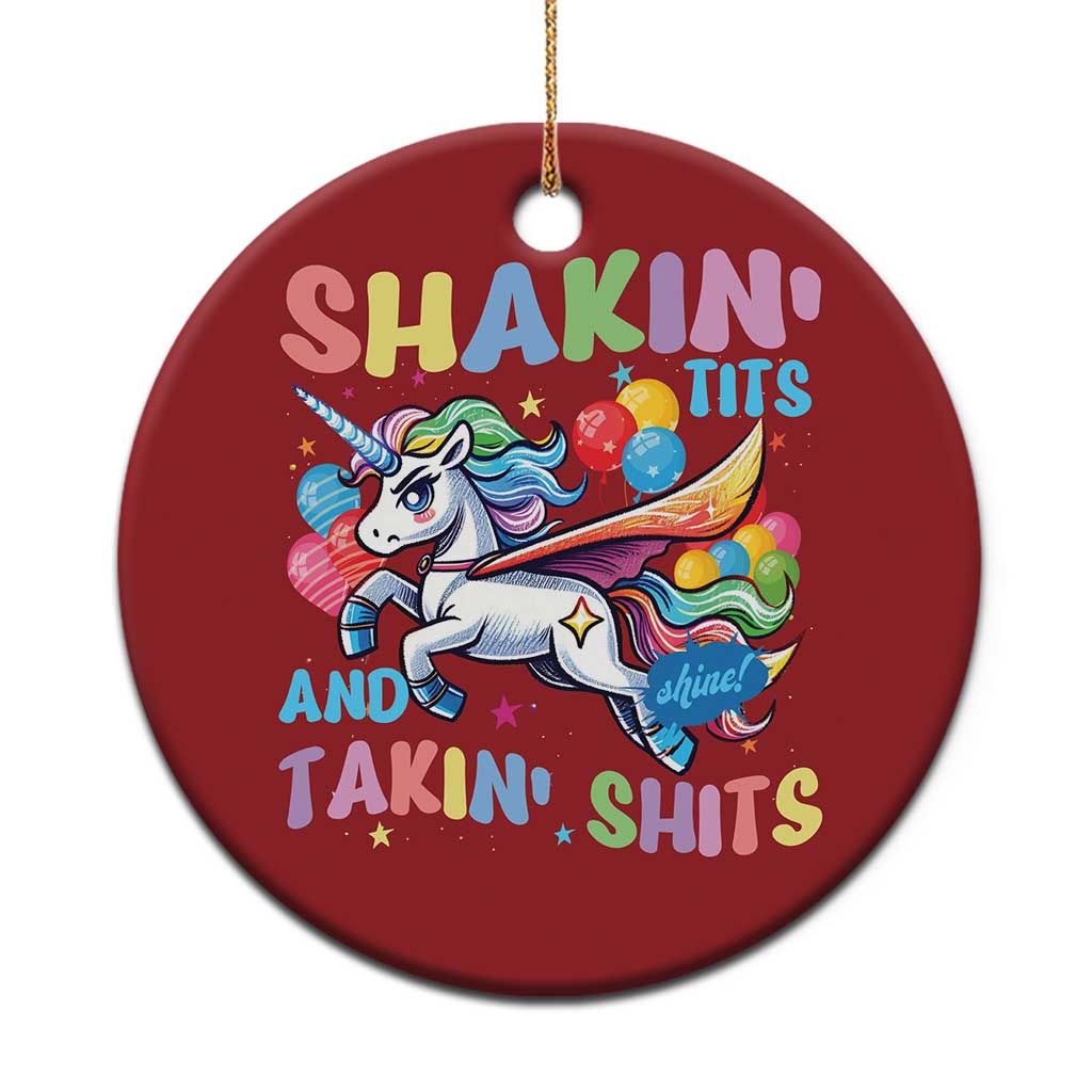 Red round unicorn Christmas ornament with multicolor text and hanging gold string