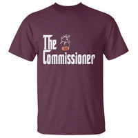 Maroon crew-neck short-sleeve t-shirt with “The Commissioner” football graphic