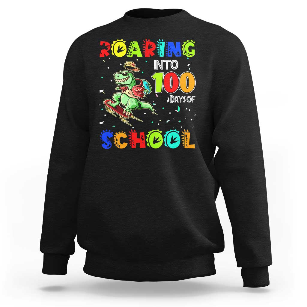 Black crewneck sweatshirt with roaring dinosaur "100 days of school" graphic.