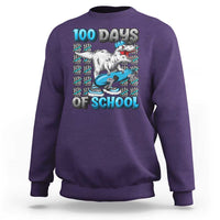 Purple sweatshirt with dinosaur and '100 DAYS OF SCHOOL' front print