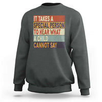 Charcoal gray sweatshirt with colorful inspirational quote graphic on the front