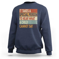 Navy blue sweatshirt with colorful inspirational quote graphic on the front