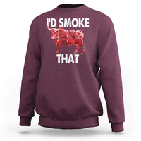 Maroon sweatshirt with “I’D SMOKE THAT” cow graphic on the back