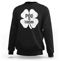 Black sweatshirt with white four-leaf shamrock and “Pog Mo Thoin” front print