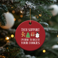 Red round Christmas ornament hanging from a gold string, Tech Support and cookie-deletion text