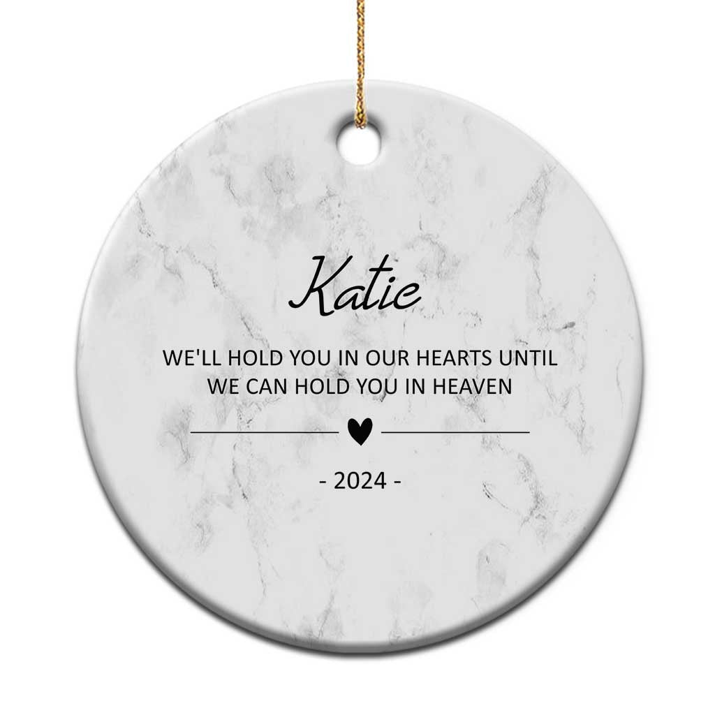 Personalized dog memorial ornament, round white marble-effect with name Katie and 2024