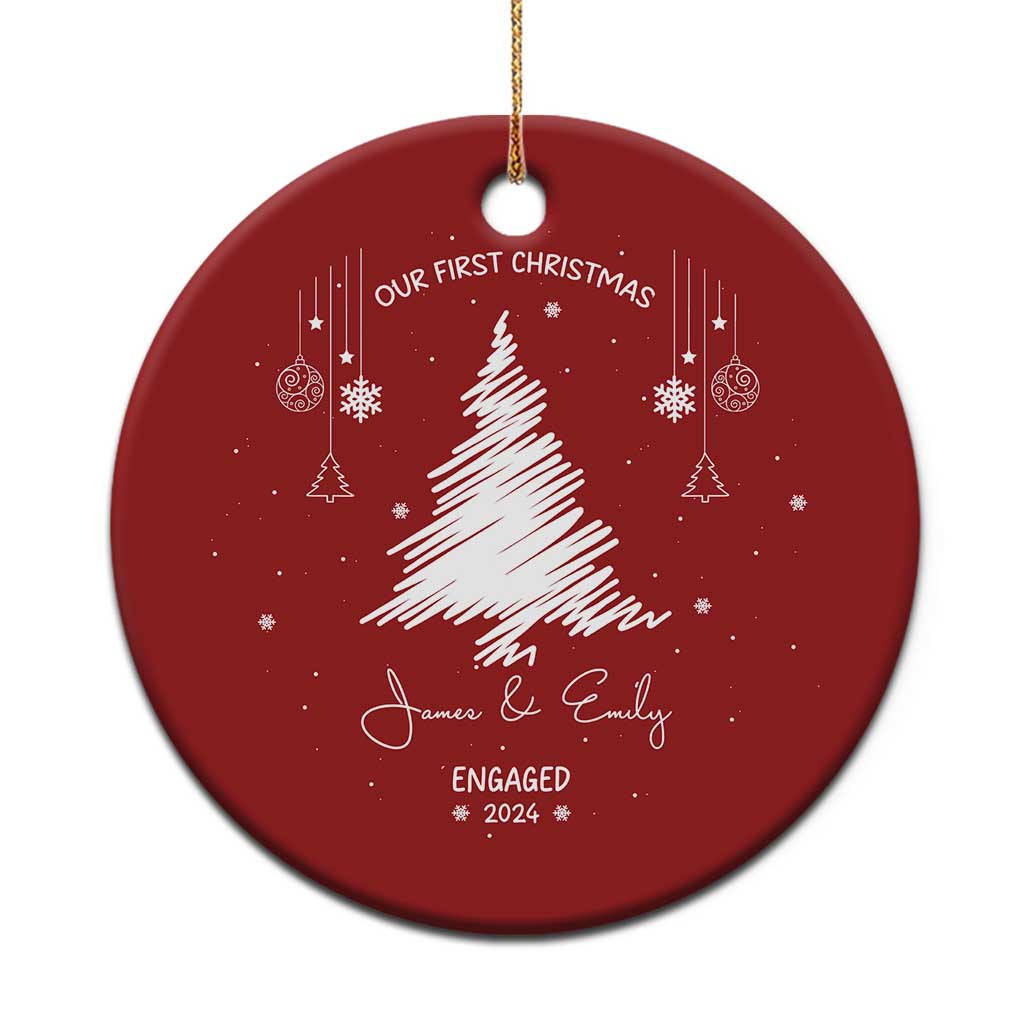 Red round custom engagement Christmas ornament with tree art, “Engaged 2024,” James & Emily