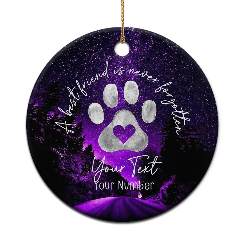 Purple galaxy round dog memorial ornament with paw print, heart, and hanging loop.