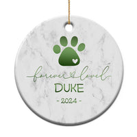Round marble pet memorial ornament with green paw-heart, name DURE, 2024