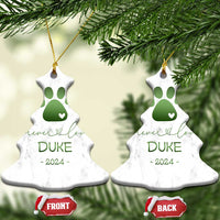 Pair of bell-shaped marble pet memorial ornaments with green paw-heart and DURE, 2024