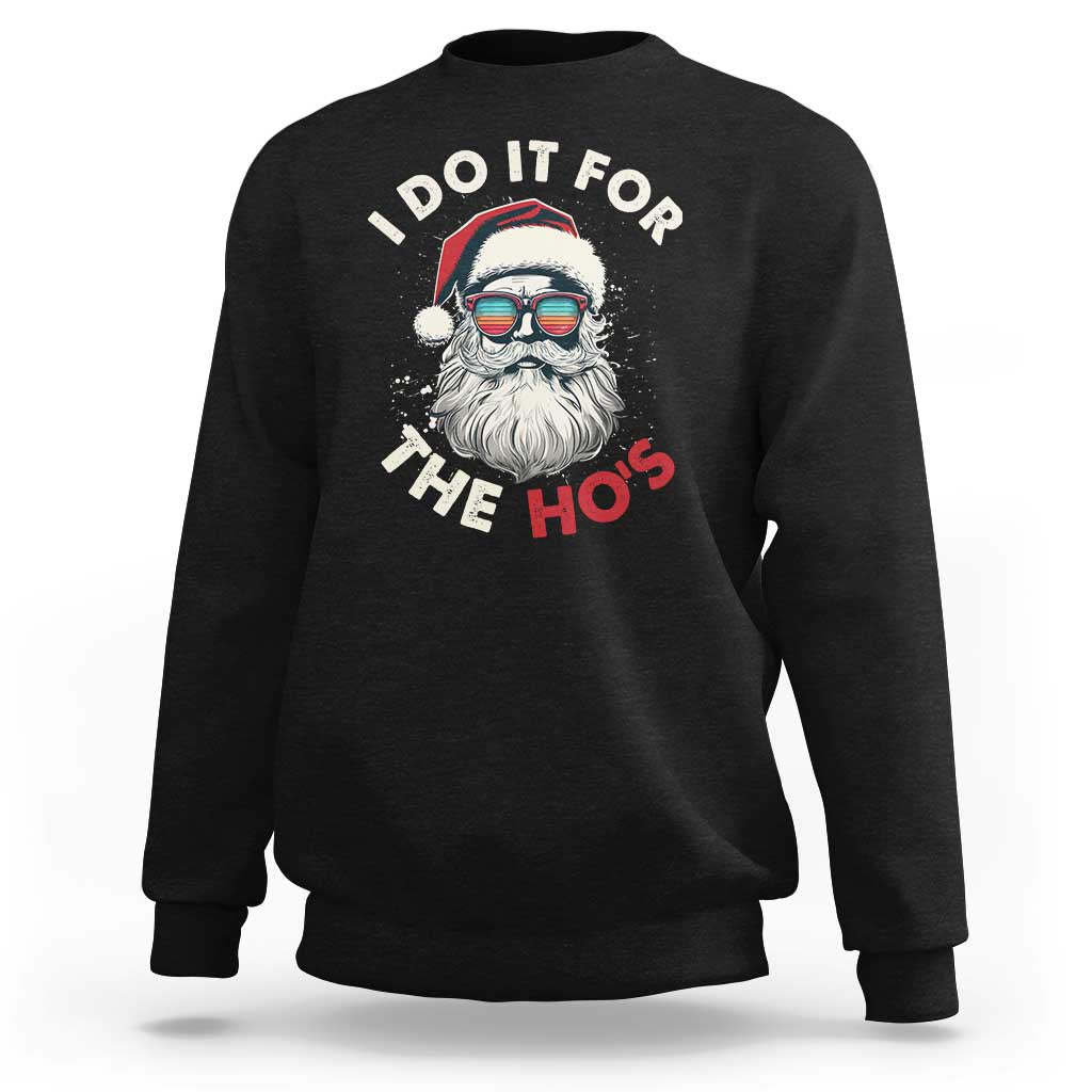 Black Christmas sweatshirt with Santa graphic and “I Do It For The Ho’s” text on chest